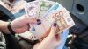 Cum influențează declinul euro și ascensiunea yuanului companiile de comerț din România